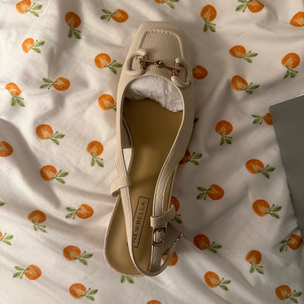 Newbella heeled sling back pumps